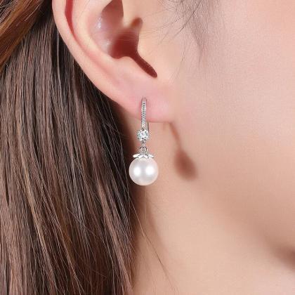 Elegant Round Imitation Pearl Dangle Earrings..