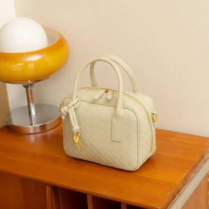 Elegant Woven Leather Satchel Handbag With Tassel..