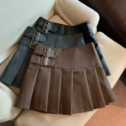 Faux Leather Pleated Mini Skirt With Buckle..