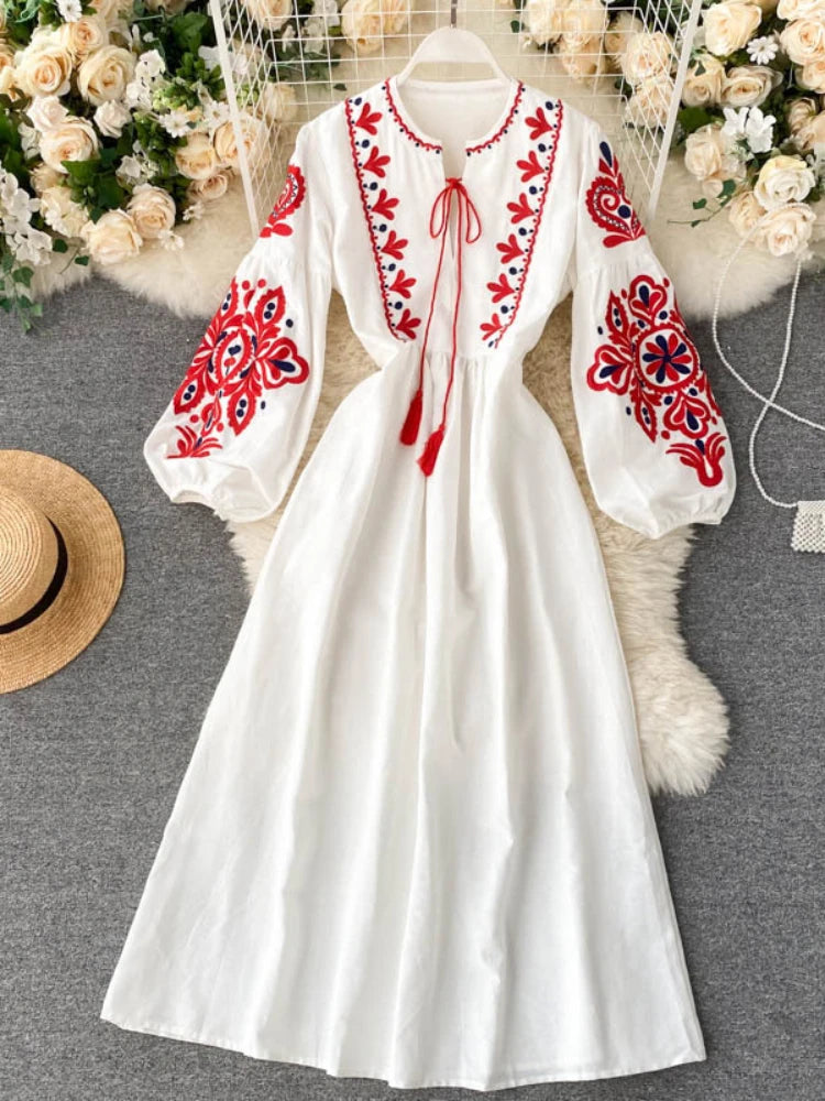 white dress with red embroidery Elevate Your Style with Embroidery Maxi DressLUXXE